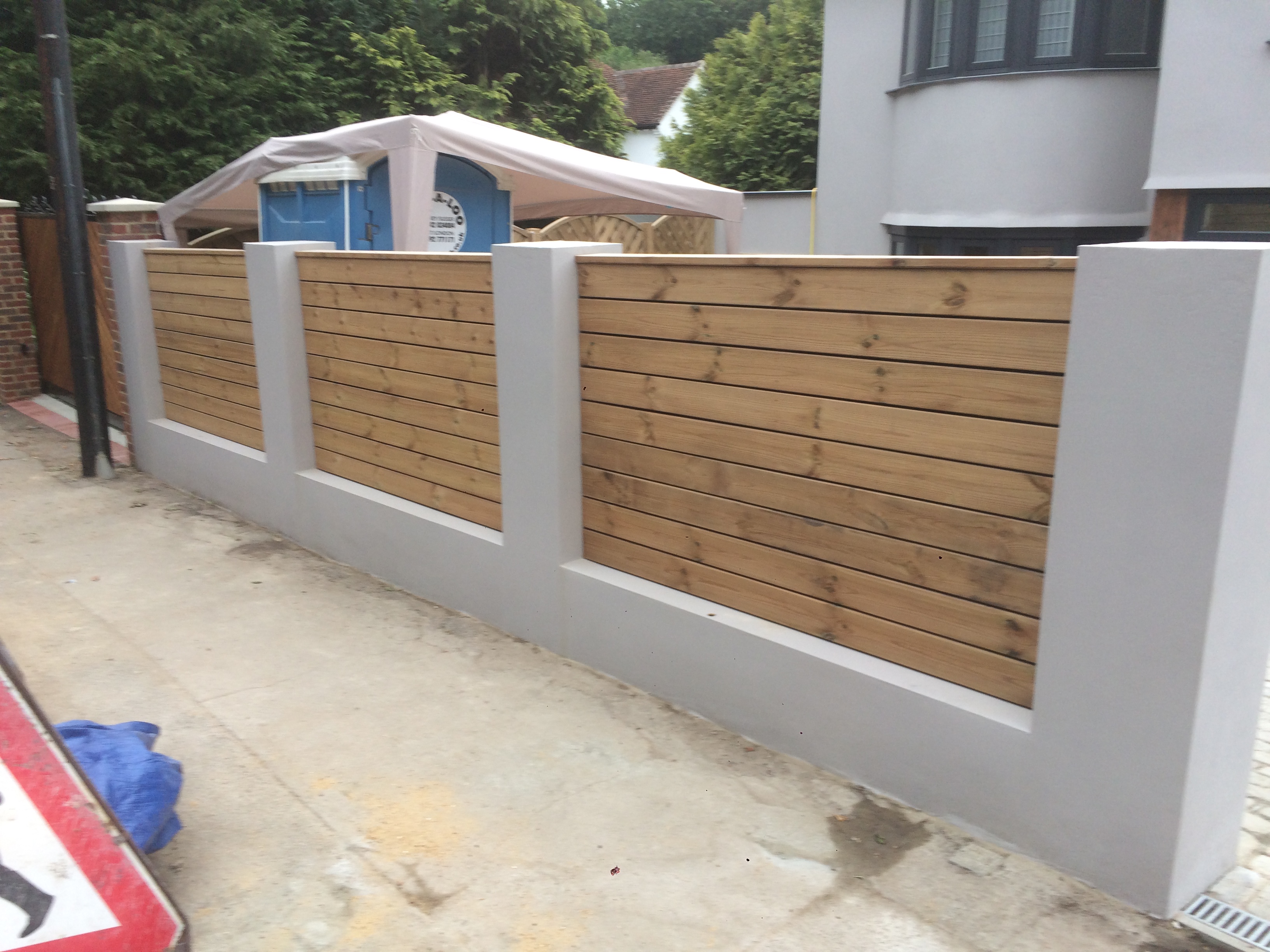 Completed boundary wall, fencing and external landscaping